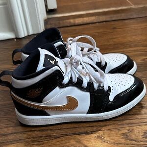 Nike Kids Jordan 1 mid with patent leather black white and Gold Swoosh